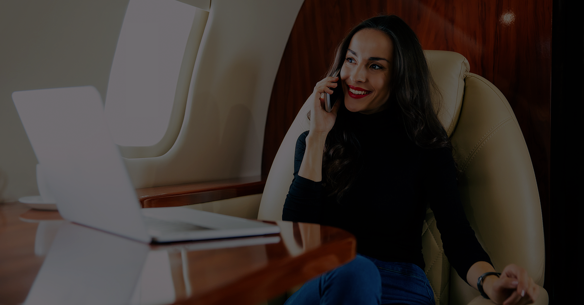 Family office CFO reviewing financial operations aboard a private jet