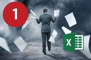 man throwing excel spreadsheets