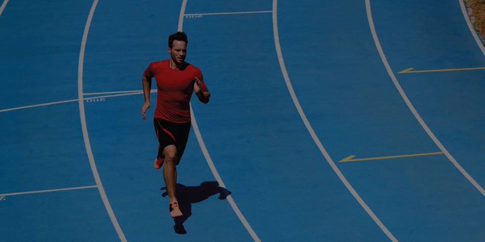 Runner moving forward on a multi-lane track, representing accounting software alternatives after Compeat Advantage's retirement