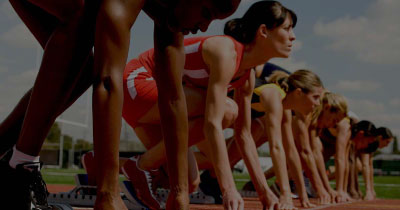 Runners at the starting line representing growing businesses ready to move beyond QuickBooks Online