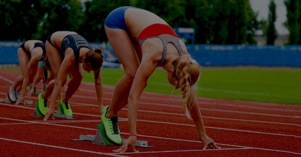 Runners preparing at the starting line before a race